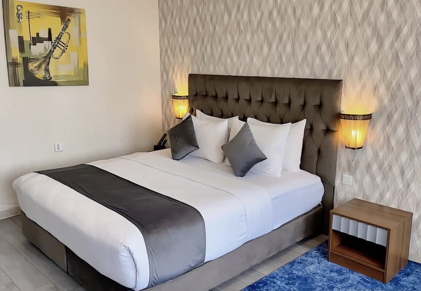 A cozy single room with a comfortable bed and modern decor